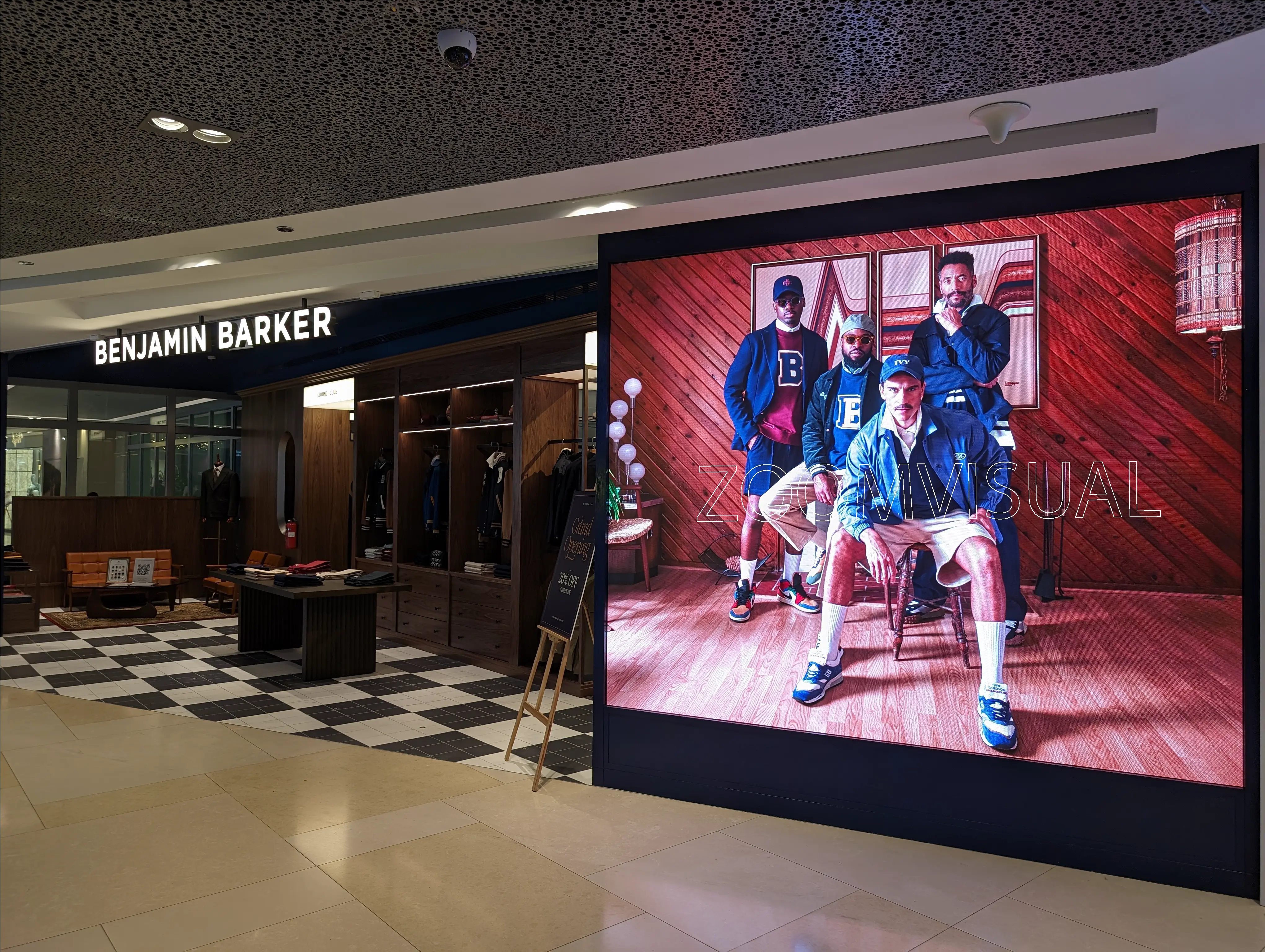 Indoor LED Screen showing models wearing Benjamin Barker apparels.